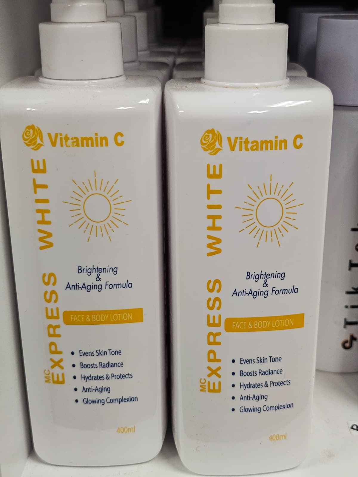 Express White Vitamin C Brightening & Anti Aging Formula Face & Body Lotion