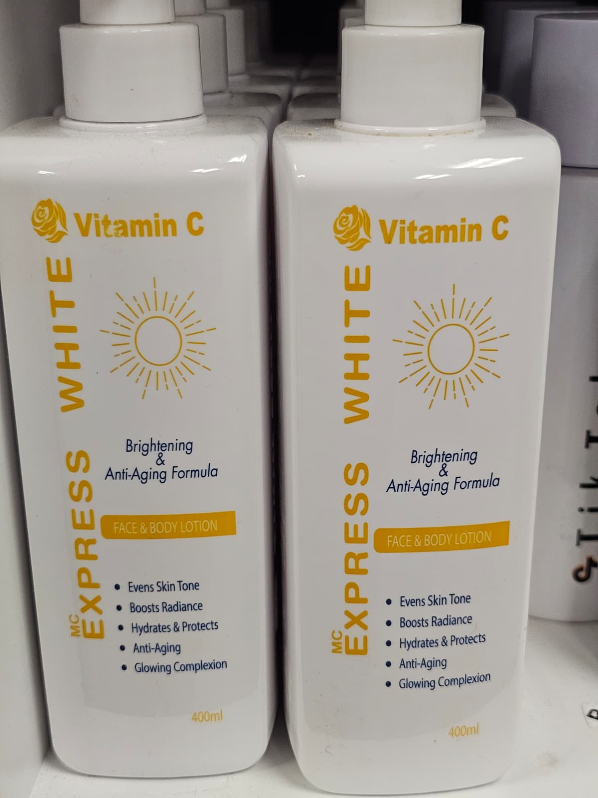 Express White Vitamin C Brightening & Anti Aging Formula Face & Body Lotion